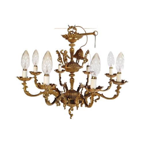 948 - A large 20th Century antique revival gilt bronze chandelier electrolier. Multiple branches with scro... 