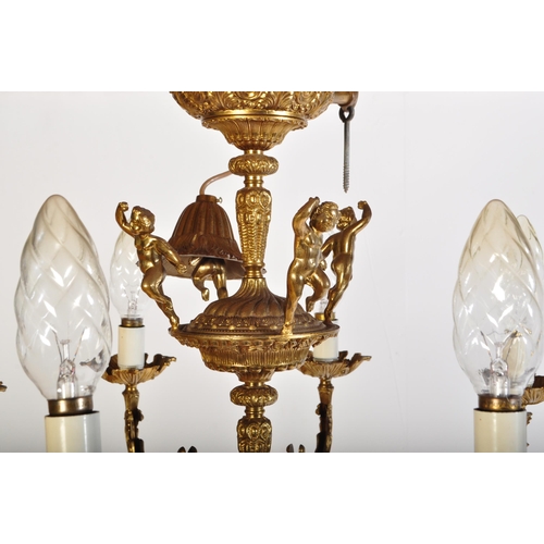 948 - A large 20th Century antique revival gilt bronze chandelier electrolier. Multiple branches with scro... 