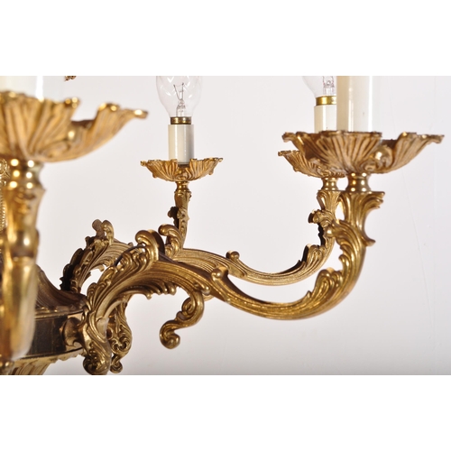 948 - A large 20th Century antique revival gilt bronze chandelier electrolier. Multiple branches with scro... 