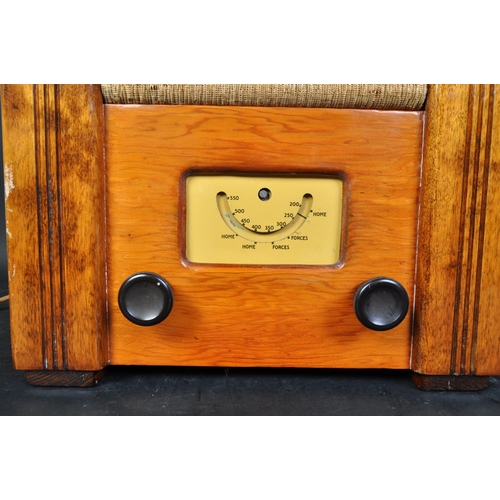 952 - A 1920’s oak Arts & Crafts large draw leaf refectory dining table raised on thick turned supports wi... 