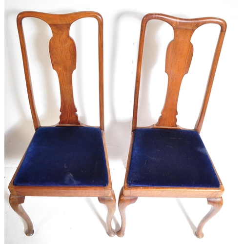 952 - A 1920’s oak Arts & Crafts large draw leaf refectory dining table raised on thick turned supports wi... 