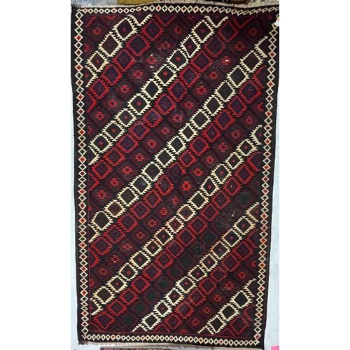 965 - A vintage mid 20th century Persian Islamic South Wes Qashqai Kilim floor rug carpet having a series ... 