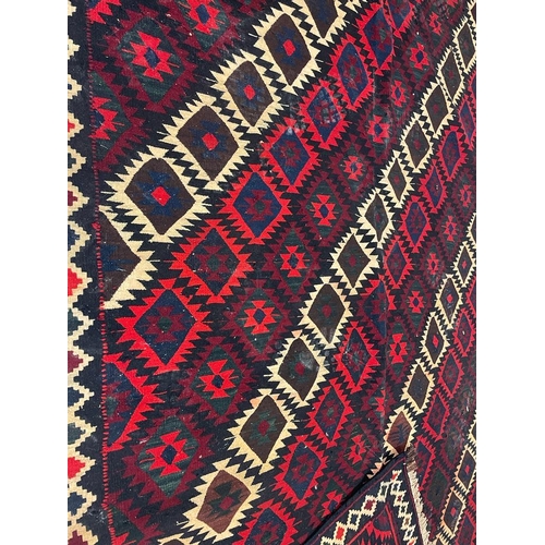 965 - A vintage mid 20th century Persian Islamic South Wes Qashqai Kilim floor rug carpet having a series ... 