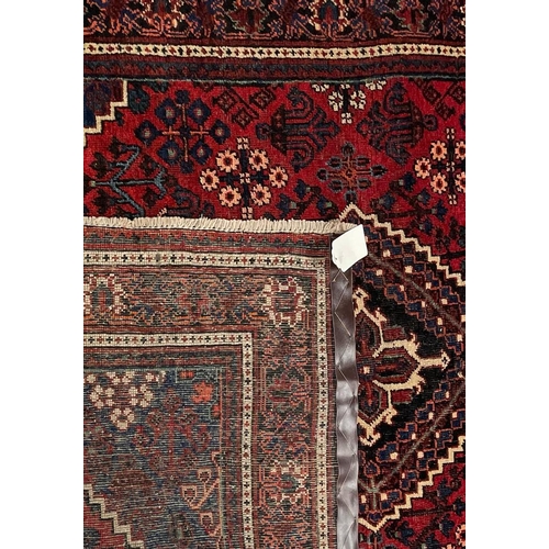 974 - A 20th century North West Persian Islamic Josheghan floor rug carpet having a central medallion surr... 