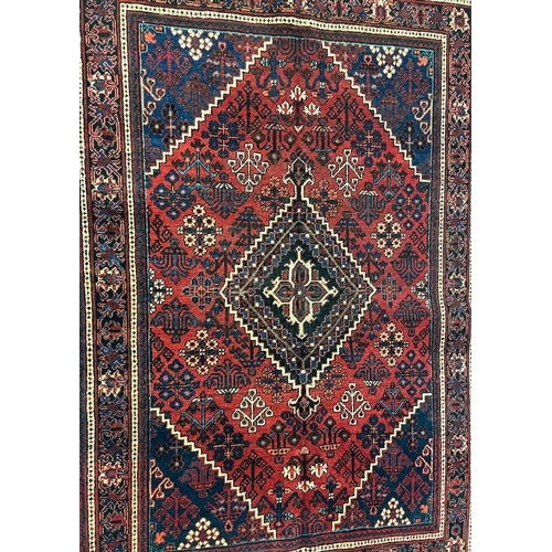 974 - A 20th century North West Persian Islamic Josheghan floor rug carpet having a central medallion surr... 