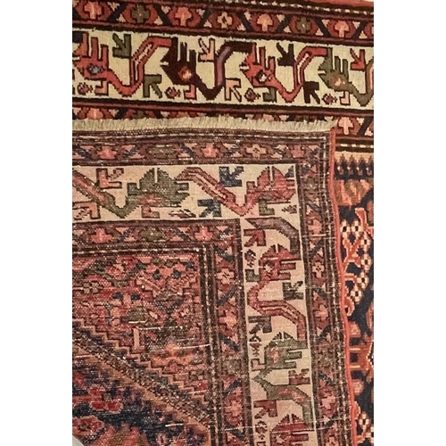 976 - A 20th century North West Persian Islamic Malayer floor rug carpet having a central panel decorated ... 
