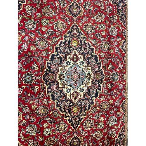 983 - A large 20th century Central Persian Islamic Kashan floor rug carpet having a central cobalt, light ... 