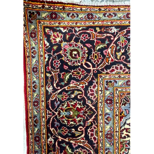 983 - A large 20th century Central Persian Islamic Kashan floor rug carpet having a central cobalt, light ... 