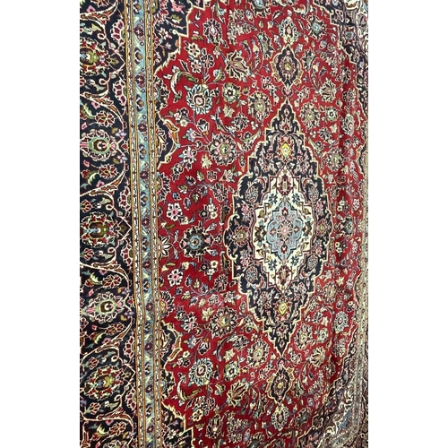 983 - A large 20th century Central Persian Islamic Kashan floor rug carpet having a central cobalt, light ... 