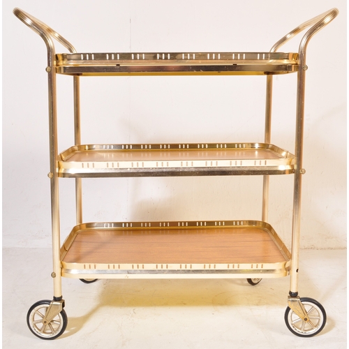 780 - A retro vintage mid 20th century butlers hostess serving cocktail trolley having a three tier of For... 