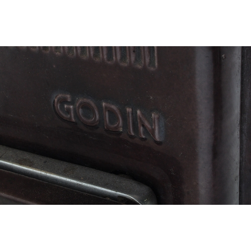 947 - An early 20th century French Godin cast iron log burning stove in a burgundy colourway. Temperature ... 