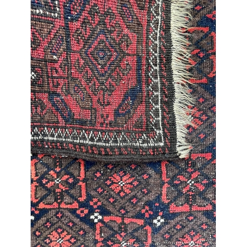 962 - A retro vintage mid 20th Century circa 1950s Persian Islamic Kilim floor carpet rug. Having central ... 