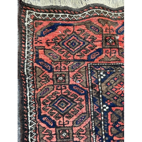 962 - A retro vintage mid 20th Century circa 1950s Persian Islamic Kilim floor carpet rug. Having central ... 