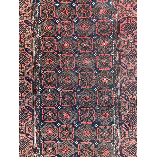 962 - A retro vintage mid 20th Century circa 1950s Persian Islamic Kilim floor carpet rug. Having central ... 