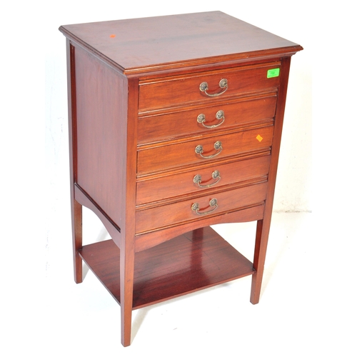 1053 - A 20th century  1920's style music cabinet having a bank of five music sheet filing drawers with hin... 