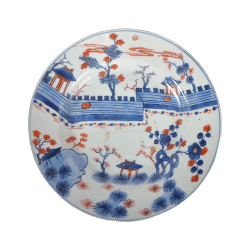 121 - An 18th Century Chinese Imari porcelain plate of circular form. Hand decorated in the Imari palette ... 