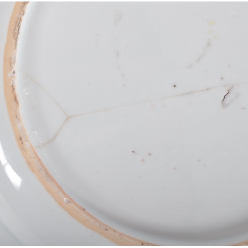 121 - An 18th Century Chinese Imari porcelain plate of circular form. Hand decorated in the Imari palette ... 