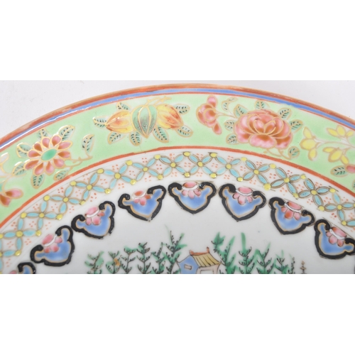 122 - A 19th Century Chinese Famille Verte porcelain plate of circular form. Hand painted Famille Verte de... 