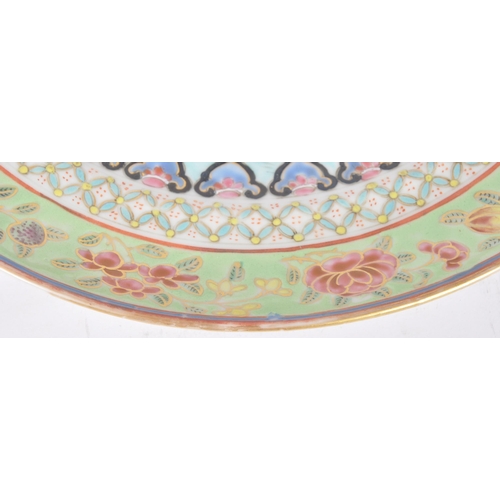 122 - A 19th Century Chinese Famille Verte porcelain plate of circular form. Hand painted Famille Verte de... 