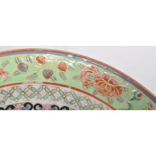 122 - A 19th Century Chinese Famille Verte porcelain plate of circular form. Hand painted Famille Verte de... 