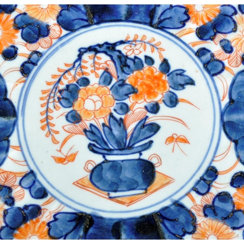 126 - A pair of 19th Century Japanese Meiji period Imari chargers of fluted form. Both with hand painted r... 