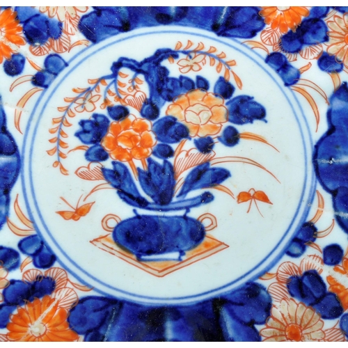 126 - A pair of 19th Century Japanese Meiji period Imari chargers of fluted form. Both with hand painted r... 