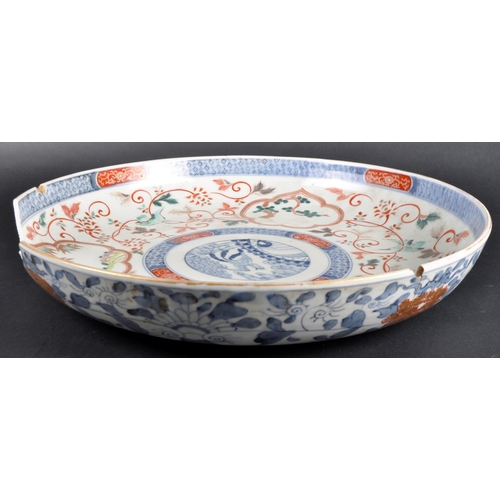 127 - A large 19th Century Chinese / Japanese Imari charger plate. Central hand painted medallion featurin... 