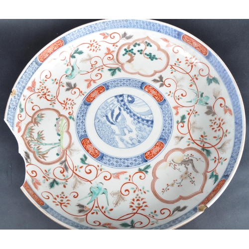 127 - A large 19th Century Chinese / Japanese Imari charger plate. Central hand painted medallion featurin... 