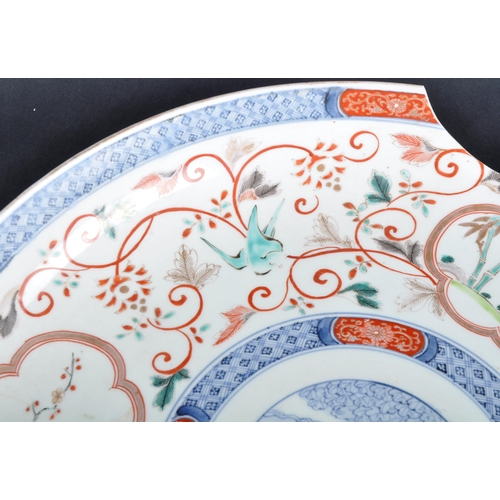 127 - A large 19th Century Chinese / Japanese Imari charger plate. Central hand painted medallion featurin... 