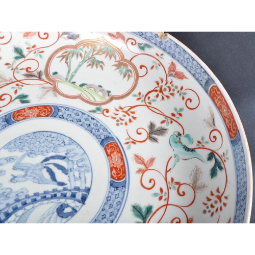 127 - A large 19th Century Chinese / Japanese Imari charger plate. Central hand painted medallion featurin... 