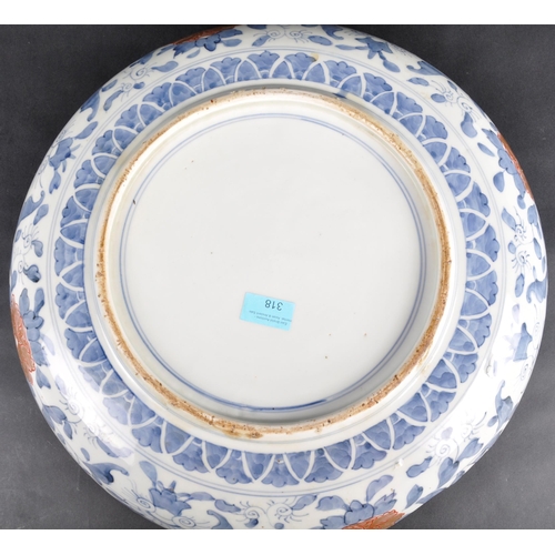 127 - A large 19th Century Chinese / Japanese Imari charger plate. Central hand painted medallion featurin... 