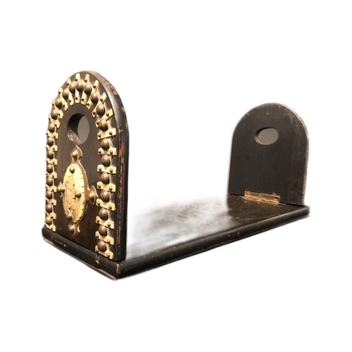 130 - A 19th Century coromandel wood and mother of pearl book trough / book slide. Twin arched sliding met... 