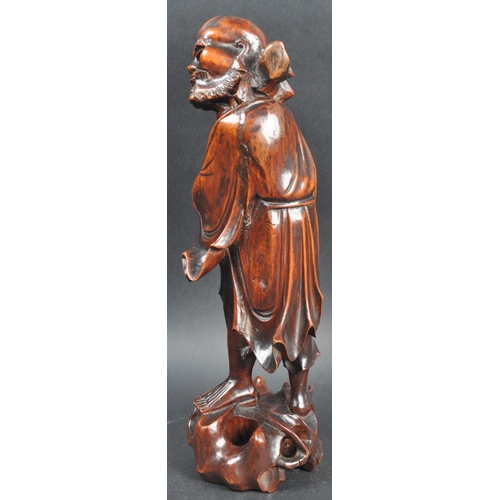 131 - A large 19th Century Chinese hand carved figurine depicting an emaciated elder immortal figurine / L... 