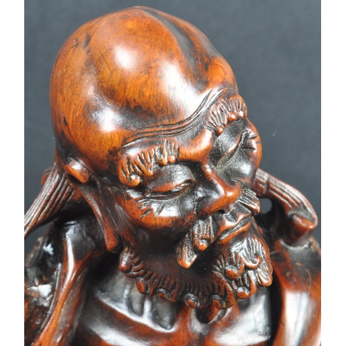 131 - A large 19th Century Chinese hand carved figurine depicting an emaciated elder immortal figurine / L... 
