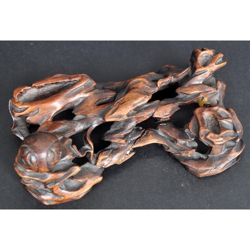 133 - An 18th Century Chinese bronze Foo Dog. The figure modelled standing with detailed features, open ja... 