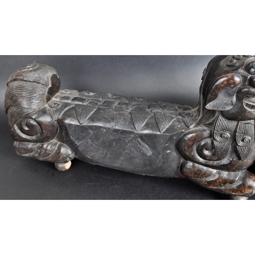 137 - A large pair of 19th Century Chinese hand carved hardwood foo dogs / temple lions. Elongated form wi... 