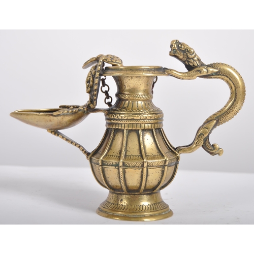 140 - A 19th century Nepalese ritual butter lamp – Sukunda. Cast and chiselled bronze of baluster form and... 