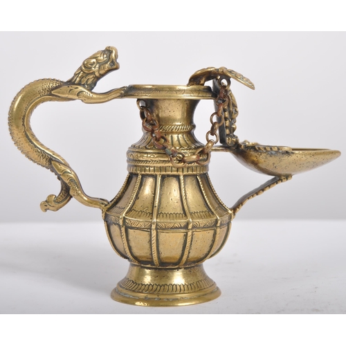 140 - A 19th century Nepalese ritual butter lamp – Sukunda. Cast and chiselled bronze of baluster form and... 