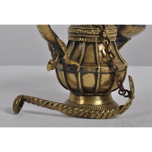 140 - A 19th century Nepalese ritual butter lamp – Sukunda. Cast and chiselled bronze of baluster form and... 