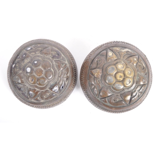 141 - A large Indonesian cast brass lime container. A spherical brass box, cast in two halves, decorated i... 