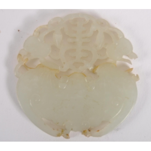 150 - A 19th Century Chinese antique hand carved jade panel depicting a bat and peaches with pierced detai... 