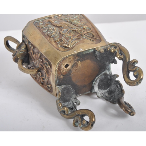 151 - An early 20th century Chinese bronze censer. A highly decorated censer depicting a phoenix on both p... 