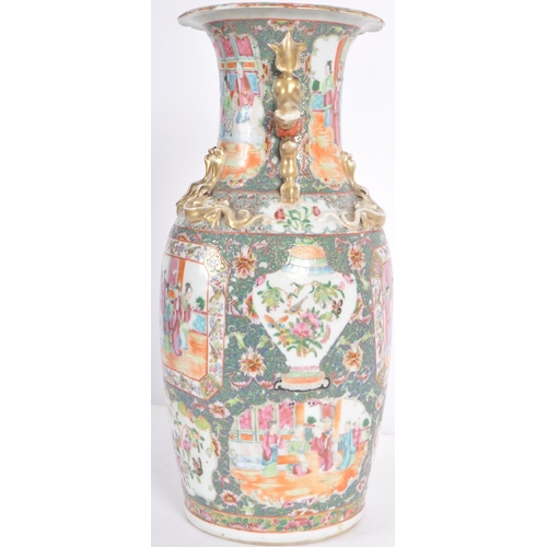 153 - A 19th Century Chinese Famille Rose porcelain vase of large size. Hand painted decoration depicting ... 