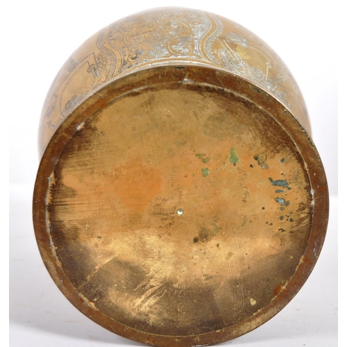 154 - An 18th Century Persian heavy bronze centrepiece vase having a flared rim with bulbous body and flar... 