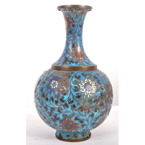155 - An early 20th Century Chinese Cloisonne vase of baluster form. Blue ground with scrolling flowers th... 
