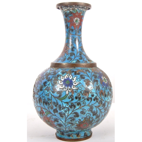 155 - An early 20th Century Chinese Cloisonne vase of baluster form. Blue ground with scrolling flowers th... 