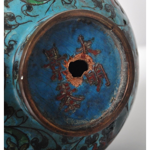 155 - An early 20th Century Chinese Cloisonne vase of baluster form. Blue ground with scrolling flowers th... 