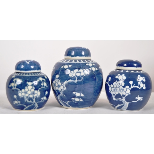156 - A trio of early 20th Century Chinese porcelain blue & white ginger jars. Cobalt blue ground with whi... 