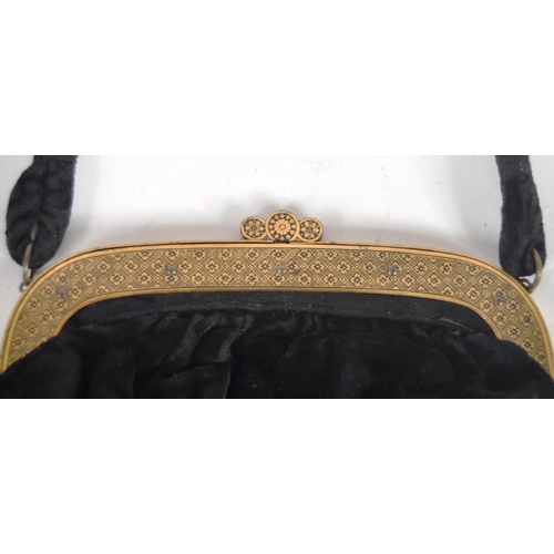 157 - A 20th century large Japanese Komai style purse / clutch bag. A black felt material, with Komai styl... 