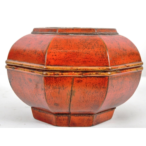 159 - An early 20th Century Chinese red lacquer storage box / lidded prayer box of cushioned hexagonal for... 
